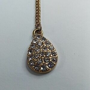 Goldtone lariat necklace with teardrop rhinestone‎ pendant